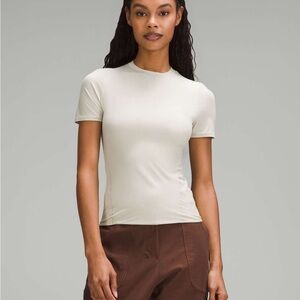 Lululemon Wundermost Ultra-Soft Nulu Hip Length Cream Crewneck Shirt Size XS